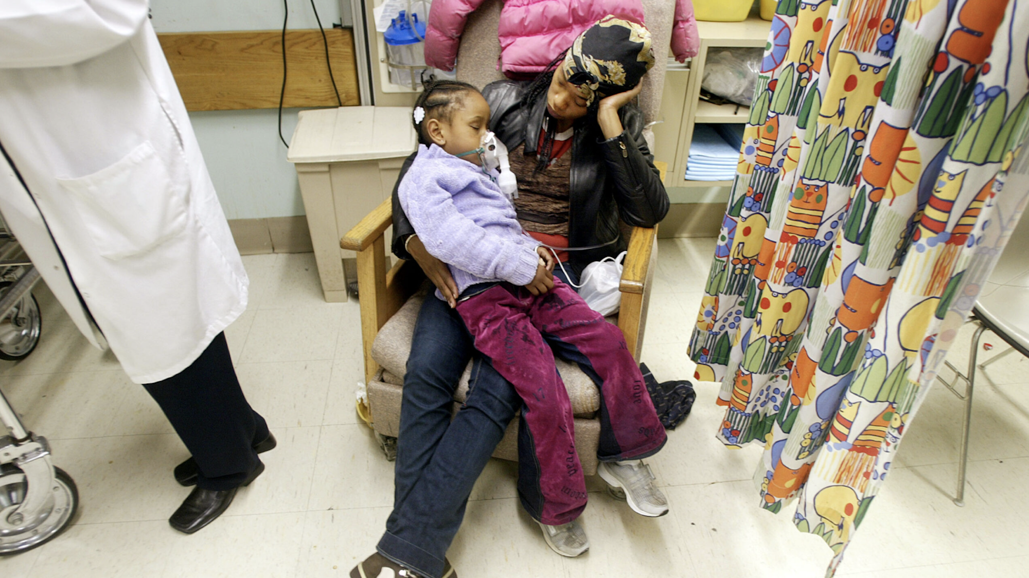 In a file photo, a five-year-old child is treated in a New York City emergency room after an asthma attack.