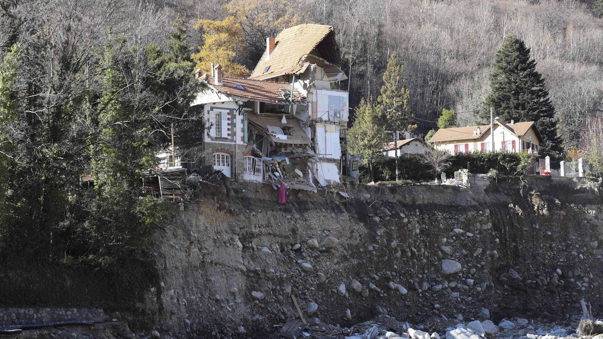 A damaged house in the village of Saint-Martin-Vesubie, southeastern France, on Dec, 3, 2020, two months after heavy rains and brutal floods left areas cut off from the world in the French Alps