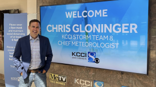 A photo of Chris Gloninger next to a TV that says, "Welcome Chris Gloninger"