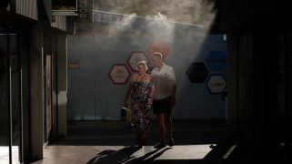 People walking through cooling misters in Las Vegas
