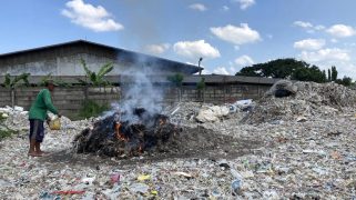 A plastic dump, full of foreign waste, near a paper mill in East Java.