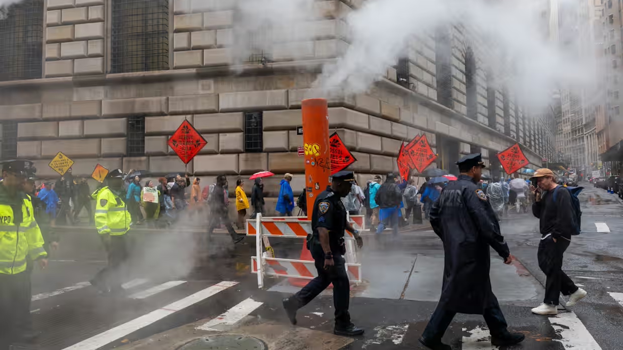 Climate activists demonstrate in lower Manhattan as New York City prepares to host the United Nations general assembly.