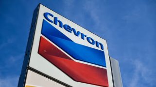 Chevron sign with a bloe sky behind it