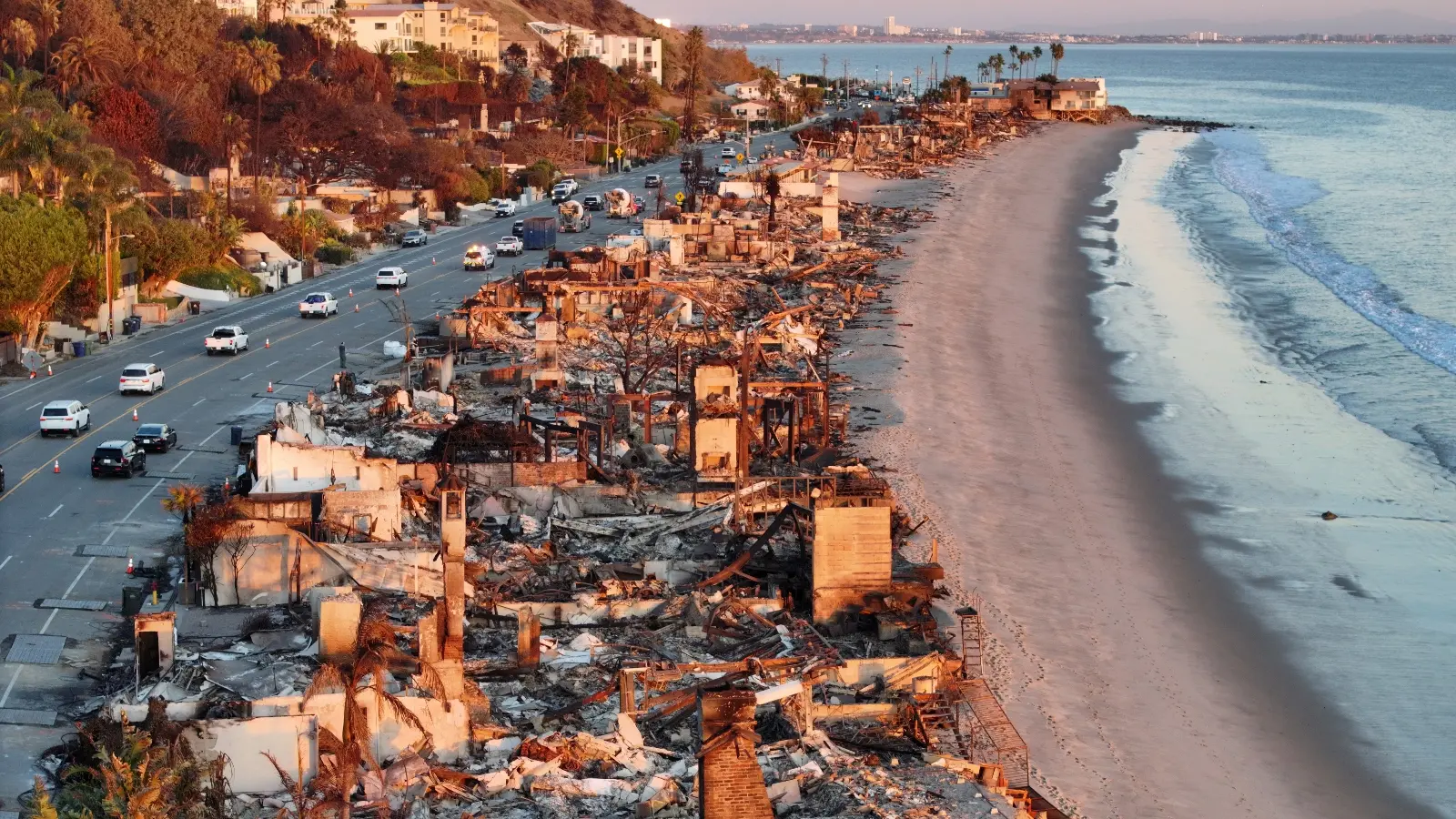 A seashore with destroyed houses.