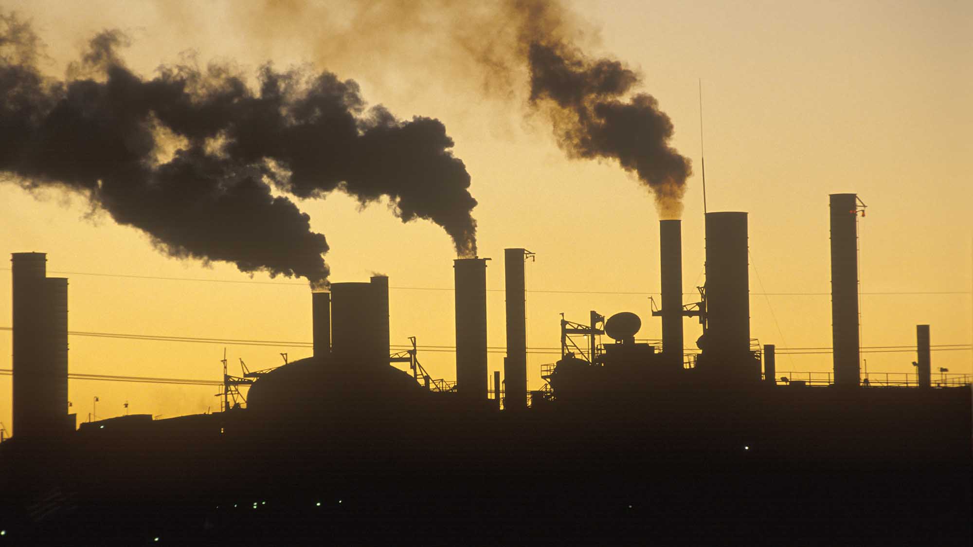 Factory at sunset in Cleveland, Ohio (Photo by: Joe Sohm/Visions of America/Universal Images Group via Getty Images)