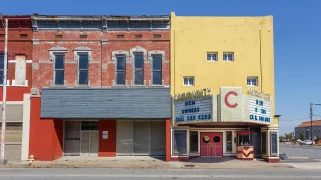 Empty storefronts on a rural town street.
