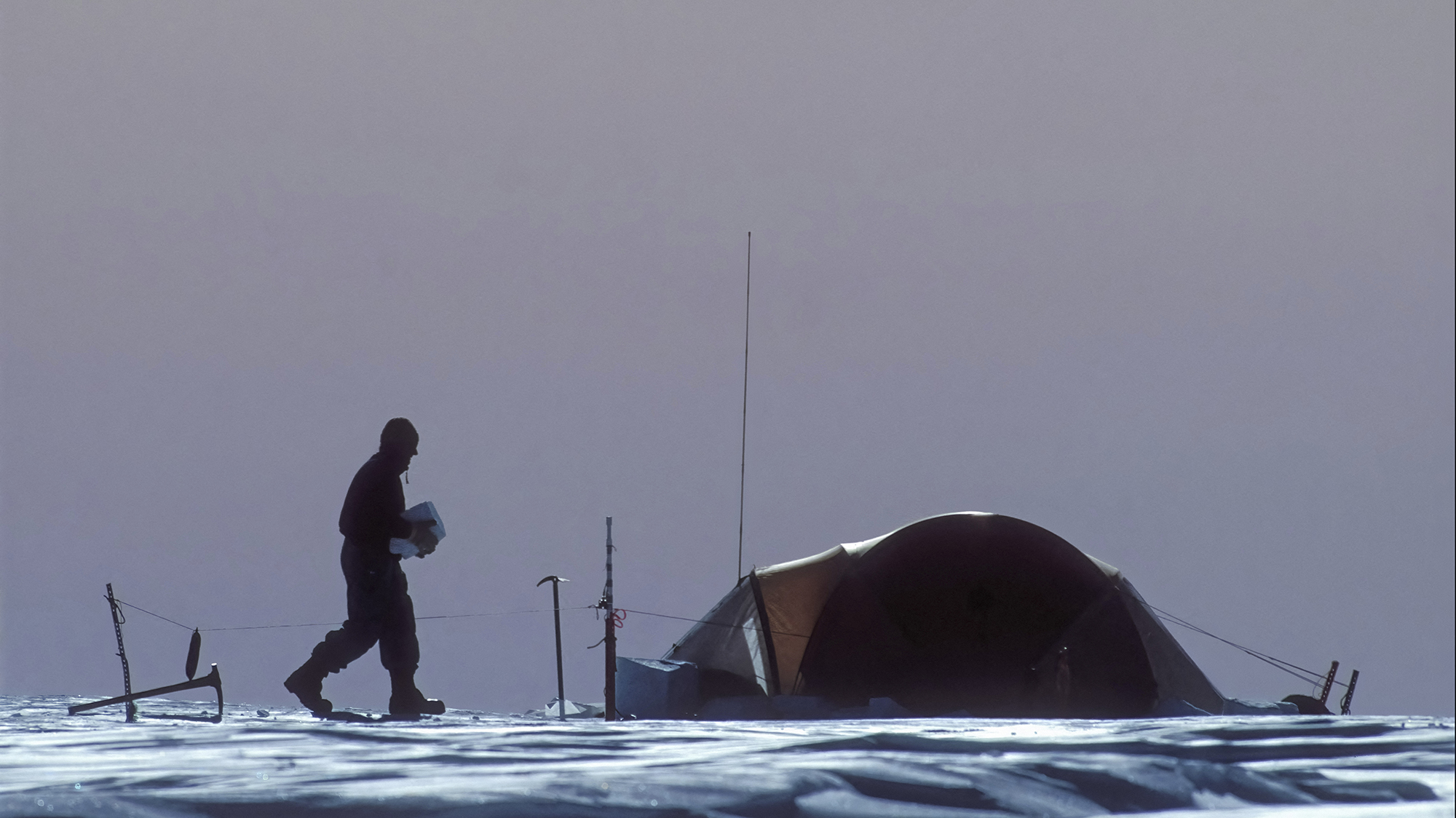ANTARCTICA - REGION OF THE EREBUS VOLCANO - EREBUS EXPEDITION - CAMP N? 4: TO STRENGTHEN IT AND PROTECT ITSELF FROM THE VIOLENT GUSTS OF WIND, FREQUENT IN ANTARCTICA, JEAN LOUIS ETIENNE REINFORCES HIS IGLOO TENT BY SURROUNDING IT WITH BLOCKS OF ICE. Photo by Stephane Compoint/Only World/Abaca/Sipa USA(Sipa via AP Images)