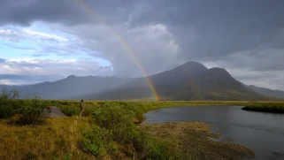 A rainbow over a river